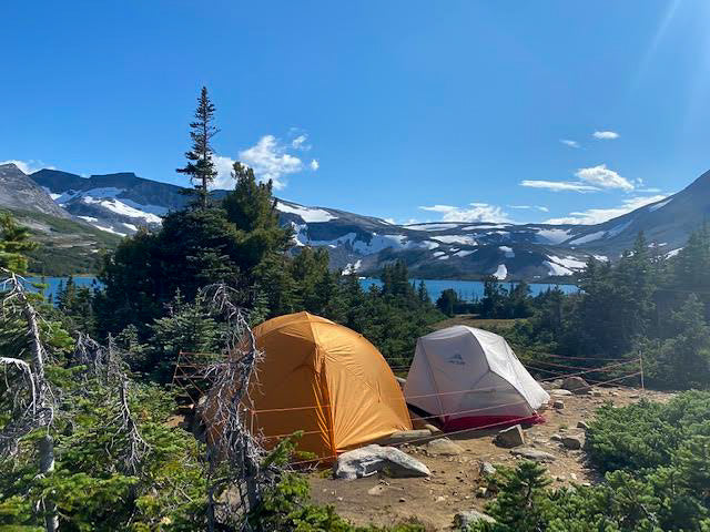 Customer using electric bear fence around two backpacking tents - Bearwatch Systems